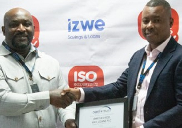 An official of Izwe receiving the certification