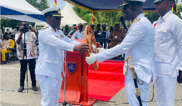 Commodore (Cdre) Emmanuel Ayesu Kwafo (L) handing over his duties