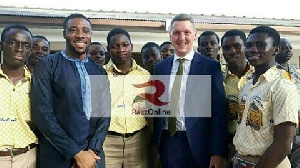 Iain Walker, the British High Commissioner with a section of students of Accra Academy