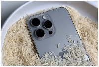 Apple has cautioned users against dipping their phones in a bag of rice