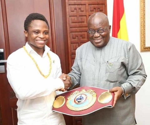 Isaac Dogboe presented the belt to President Akufo-Addo at the Jubilee house on Wednesday