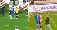 fan attacks goalkeeper with corner flag