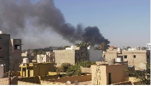 Smoke rises amid clashes between armed factions in Tripoli, Libya on August 15, 2023.