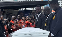 A scene from the funeral of Dada KD