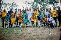 Dede Ayew with the Black Challenge players after the donation