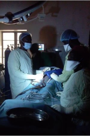 Doctors In Surgery With Flashlights Tamale