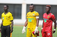 Asante Kotoko goalkeeper, Danlad Ibrahim and Patrick Asmah (standing next to his left)