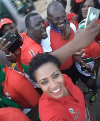 Kennedy Agyepong poses for the cameras with some NDC supporters