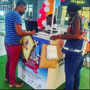 Shoppers at Achimota Mall complete entry forms