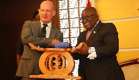 Irish Ambassador to Ghana, Sean Hoy (left) being presented with a traditional stool and other gifts