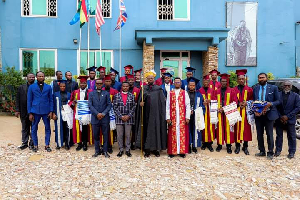 Bishop Sam Owusu with the newly-ordained priests