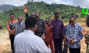 Clergymen praying at a galamsey site