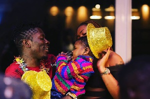 Shatta Wale with his wife and son