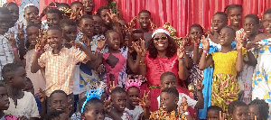 Judith Adjobah Blay having fun with some of the children