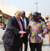 Minister of Roads and Highways, Kwasi Amoako-Attah (r) at the project site