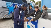 Sulley Muntari signing autographs for Pescara fans before kick off the game against Lazio