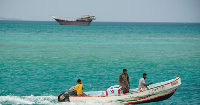 Yemeni fishermen sail in the waters overlooking the strategic Bab el-Mandeb Strait, Yemen
