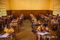 File Photo of pupils writing BECE