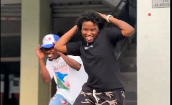 Afronitaaa (in black shirt) dancing with Dancegod Lloyd (in white shirt)