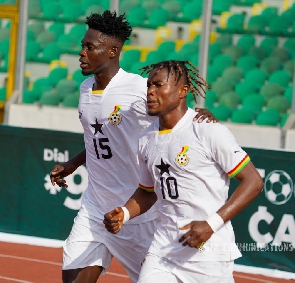 Black Meteors striker Fatawu Issahaku (right) celebrates with a teammate