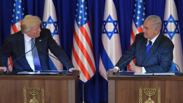 An old photo of Donald Trump (L) with Benjamin Netanyahu
