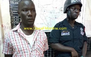 Baba Alhassan [L] was picked up after refusing to honour an invitation from the police