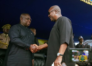President Mahama shaking hands with Juluis Maada Bio