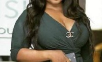 Yvonne Okoro flaunts cleavage.