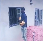 CCTV captures suspected thief removing newly installed glass windows