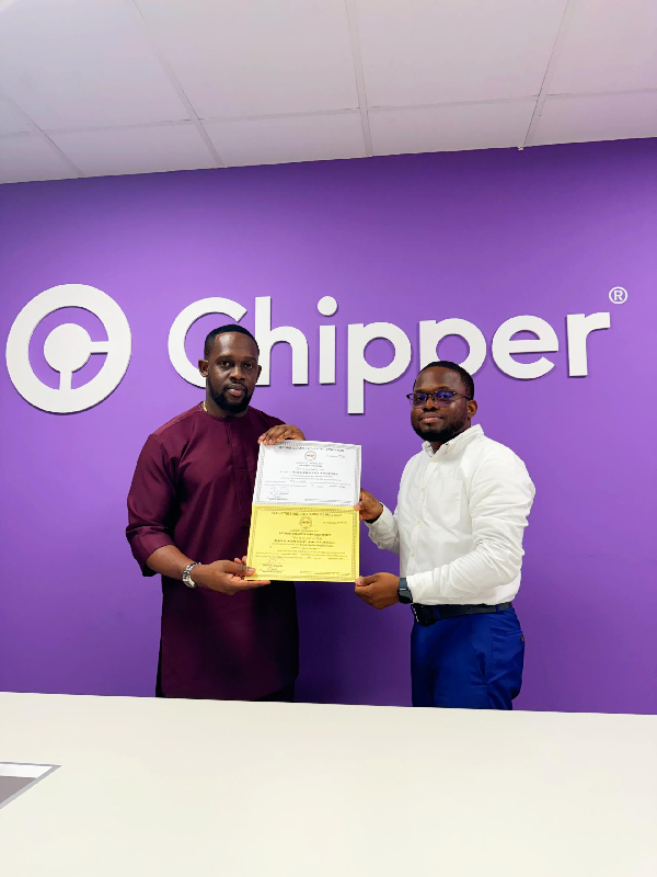 Dion Jon Taylor Samson, Chief Executive Officer of Chipper Cash receiving the license