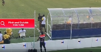 Coach Ignatius Osei-Fosu being pushed away by an official of King Faisal
