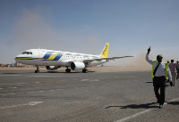 The ground staff at Khartoum International Airport welcome the first domestic flight of Sudan Airway