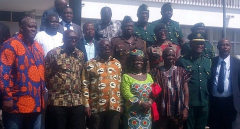 Ambrose Derry (2nd) left in a group photograph with some of the Security personnel