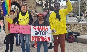 Stella Nyanzi with a placard against Ghana's anti-LGBT+ Bill