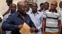 Akufo-Addo submitting his forms to the EC chairperson