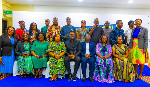 A group picture taken during the International Day for the Boy Child celebration organised by COP