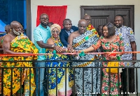 Osagyefo Amoati Ofori Panin II cutting the ribbon for the official opening
