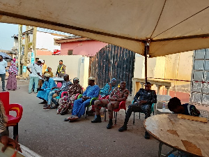 Security personnel are present at various polling centers