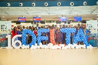 Staff of Delta Airlines pose for a group photo at KIA