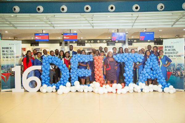 Staff of Delta Airlines pose for a group photo at KIA