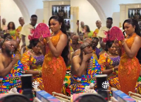 A father breaks down in tears while giving his daughter away in marriage during traditional wedding