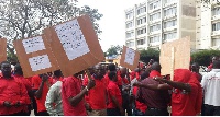 ECG workers demonstrating to have MD removed.