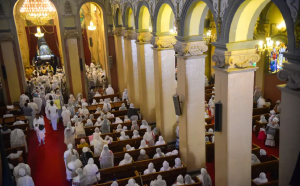 Christian Orthodox faithful pray at the Holy Trinity Church in Addis Ababa