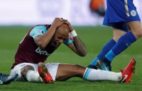 Andre Ayew reacts after missing the target narrowly