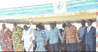 President Mahama (2nd right) joins hands with Dr Siaw Agyepong to pray for the nation and company