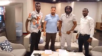 Prince Tagoe and officials of the firm after signing the deal