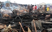 Fire destroys a dozen of wooden shops in Asawase