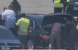 Ibrahim Mahama (in white) taking the driver’s seat of the vehicle that conveyed President Mahama