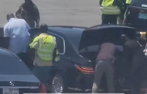 Ibrahim Mahama (in white) taking the driver’s seat of the vehicle that conveyed President Mahama