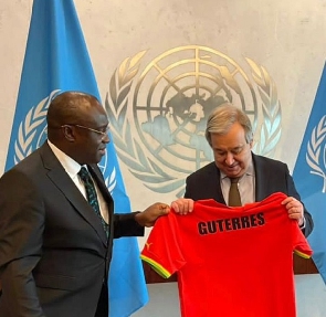 Ghanaian diplomat Harold Agyeman hands the jersey to the UN SG